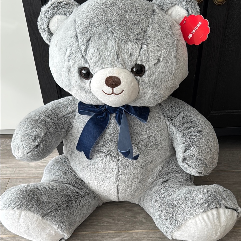 Gray Plush Teddy Bear with Blue Bow
